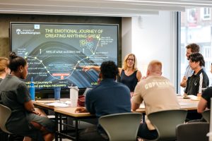 An image of a workshop being delivered to the foundership cohort by a member of the Student Enterprise team